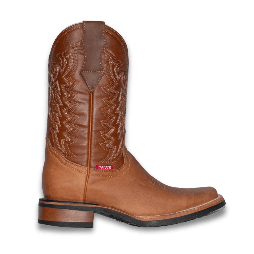 Bota Cabalgata Graso en piel miel con caña bordada, vista lateral